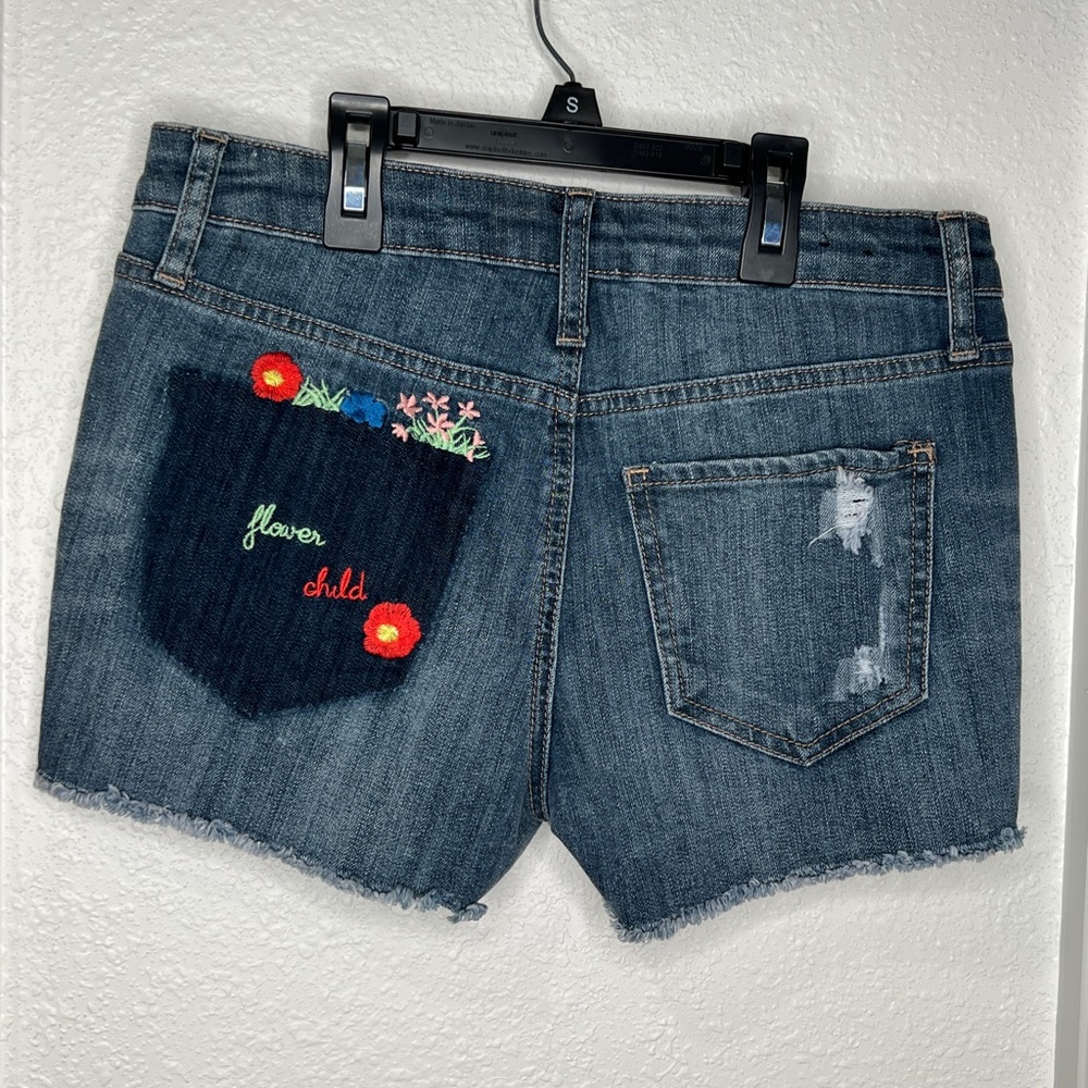 Denim shirts with floral detail